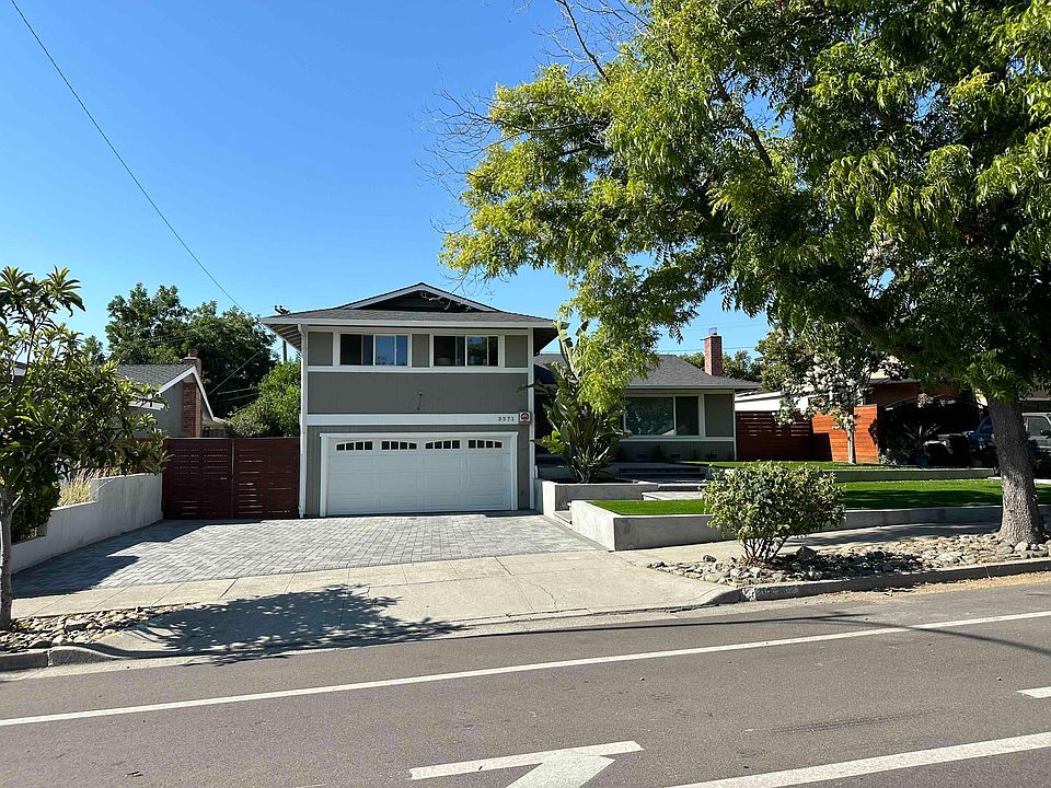 Large driveway (fits 3 vehicles), 2-car garage, can park 1 car/truck side of the house (gated)