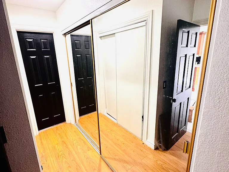 Generous closet space in the primary bedroom with a convenient entrance to the private primary bathroom.