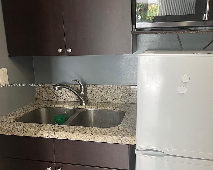 2nd image of 5835 W 14th Ln Unit 1