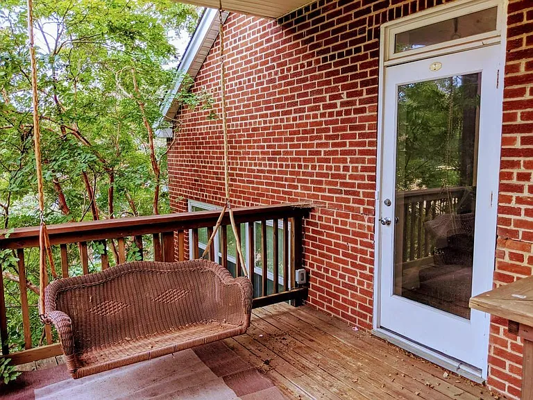 Porch, porch swing and front door
