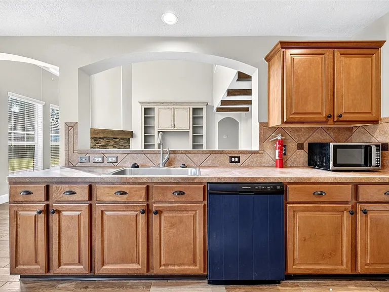 7603 Kenmark Ct — Photo 18