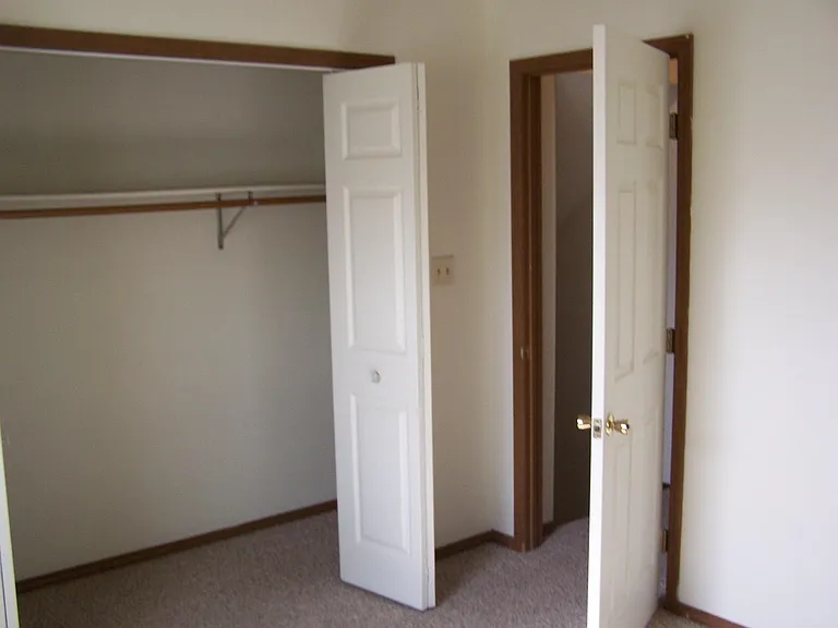 2nd bedroom with bifold closet doors.