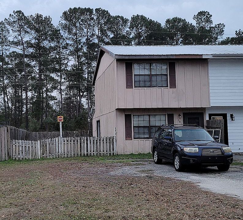 End townhome with large lot.