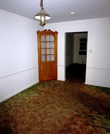 Dining room with built in corner hutch
