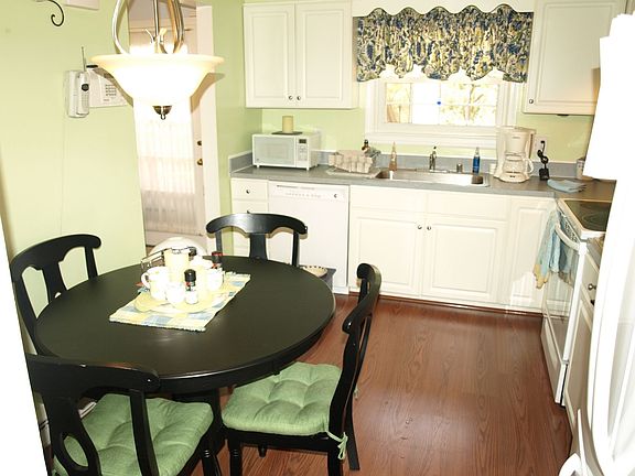 Kitchen with new appliances and flooring