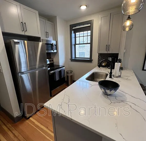630 E 16th Ave #202 — Photo 9