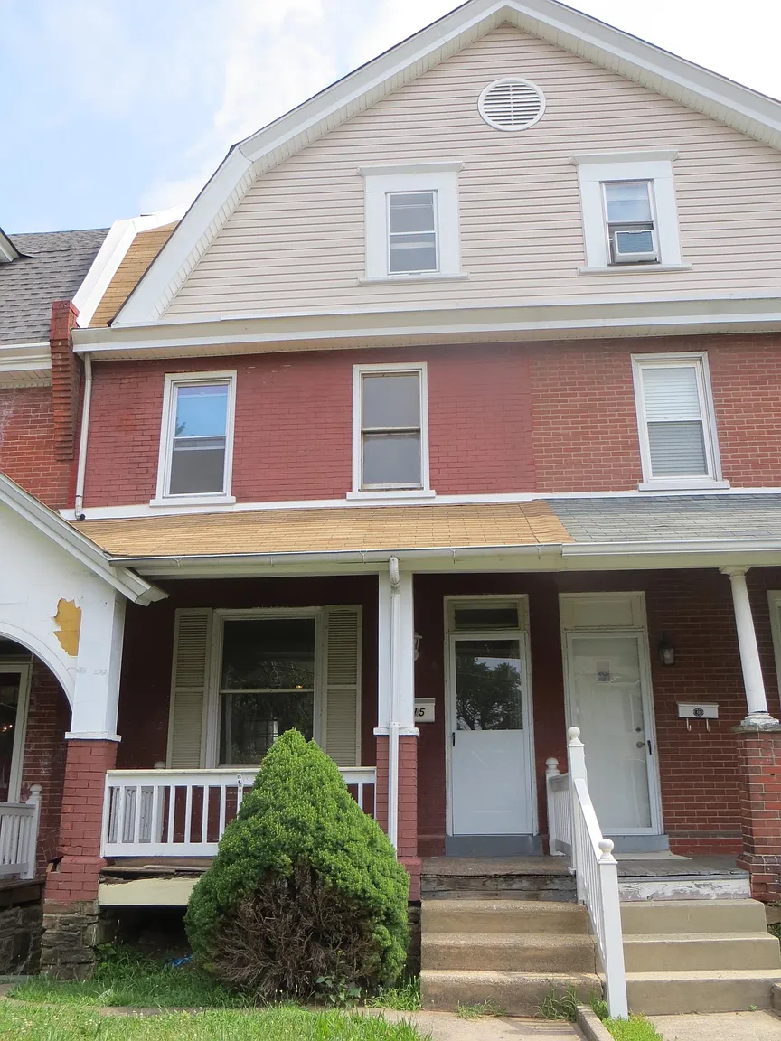 115 E 3rd St photo 1