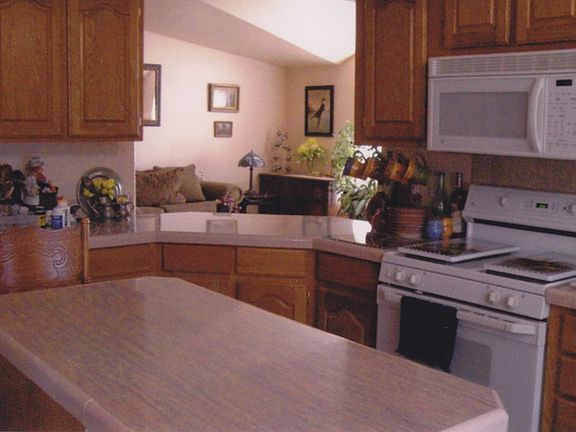 Kitchen, with island, looking towards living room.