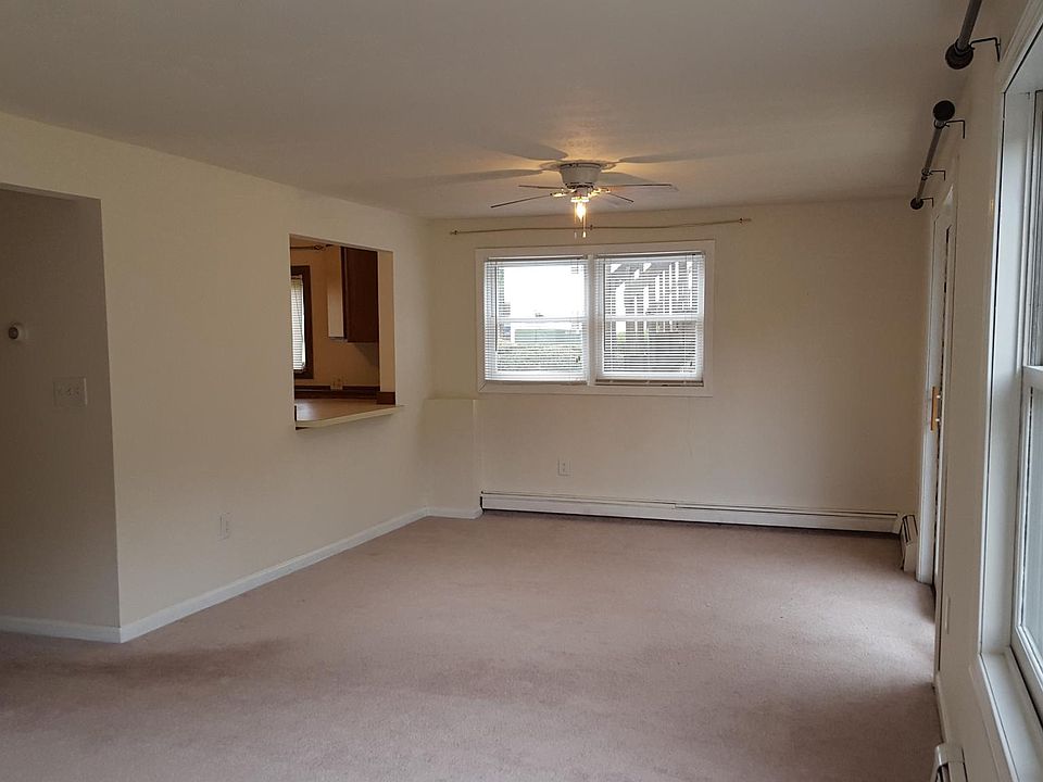 Dining Room With Breakfast Bar Window To Kitchen