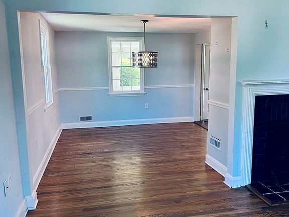 Dining Room - note paint looks blue here but it is actually very light neutral white with a blue undertone. (Behr - etched glass is the paint color).