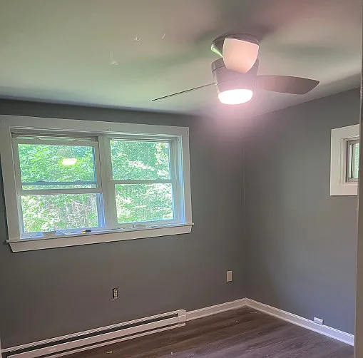 Bedroom #2. Full closet, new fan, fresh paint.