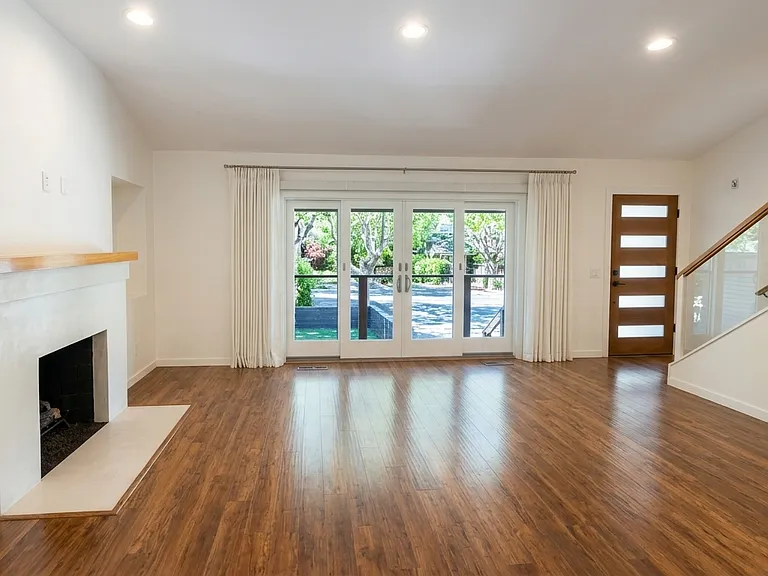 Living room south/street facing blinds open