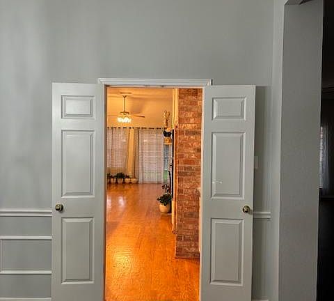 entrance to the kitchen from formal dining