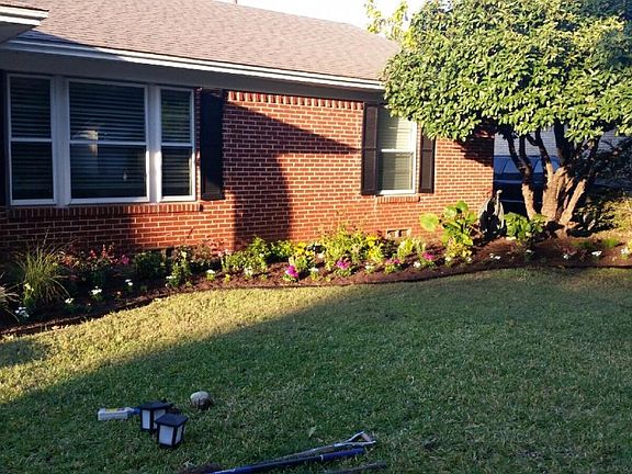 front yard with current tenant's gardening
