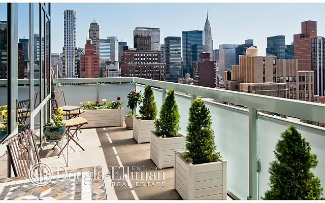 Sold by Douglas Elliman | media 75