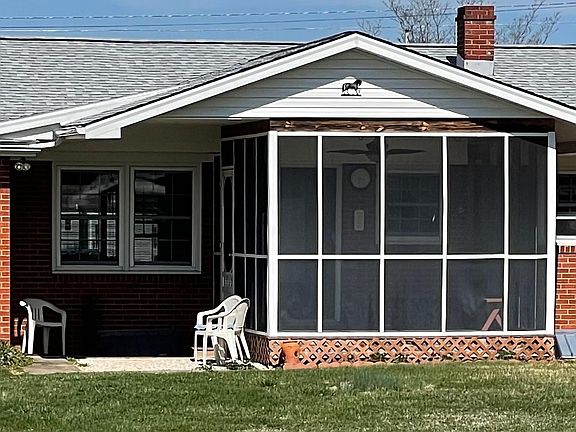 Enjoy a Spacious Screened in Back Porch.