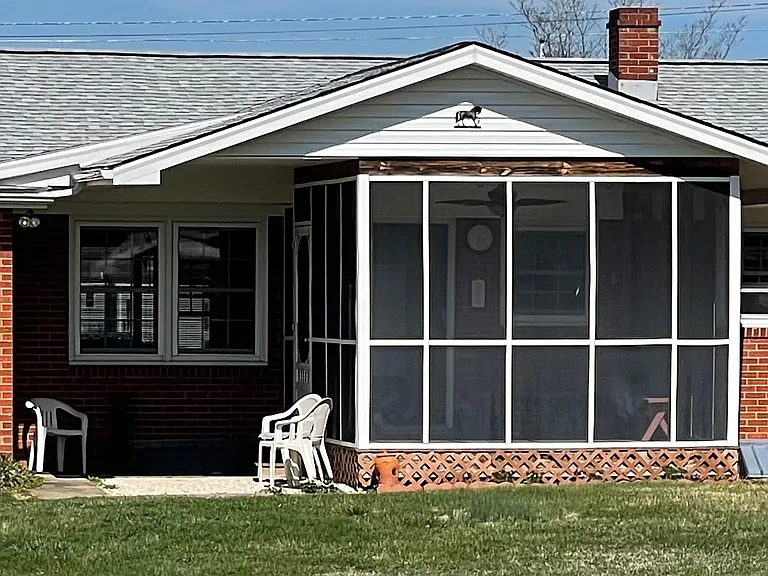 Enjoy a Spacious Screened in Back Porch.