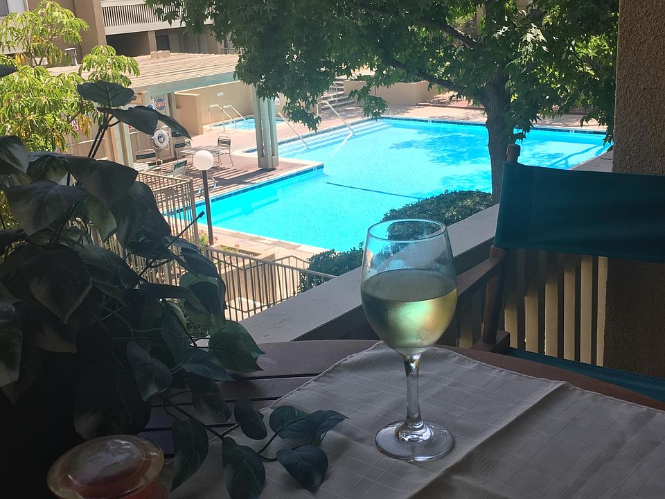 My balcony looks down to one of four pools and jacuzzis.