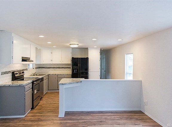 Updated kitchen with built-in eating bar.