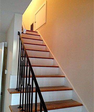 Staircase leading to upstairs front 2 bedrooms overlooking the Ashley river & rear master bedroom