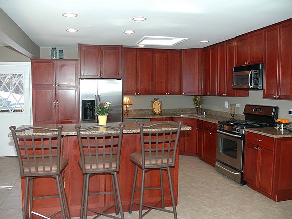 Large Open Kitchen with 42" Custom Cherry Cabinets, Granite Countertops, Flrs