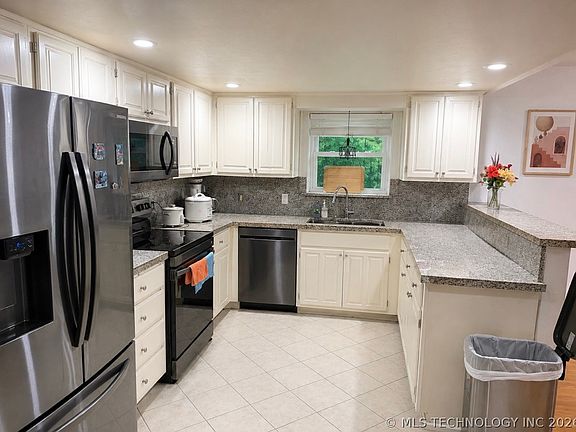 5th image of 7707 E 89th Pl