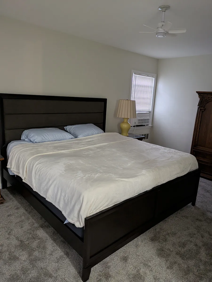 king size hybrid bed in master bedroom with fan and 10000 btu quiet window ac - Beach 126th St