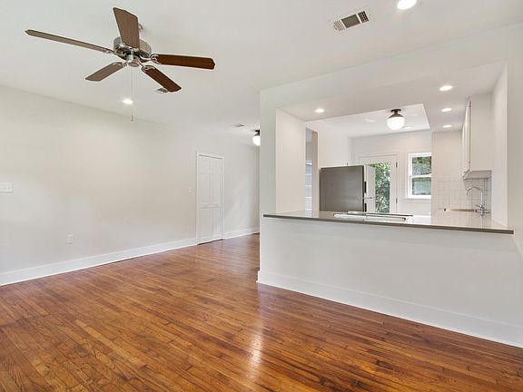 Another view of the living room and kitchen