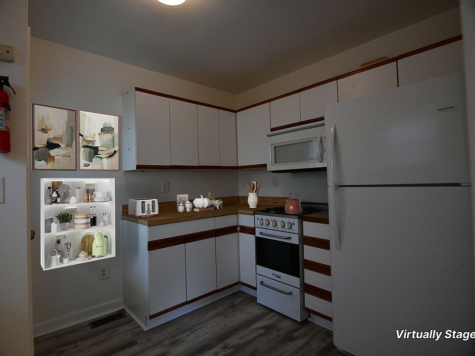 This is a view of the Kitchen taken from the door to the Dining Room.