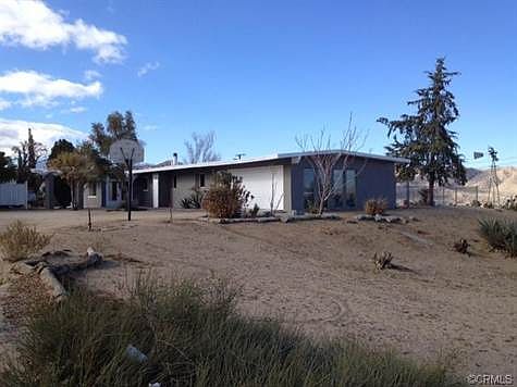 Home sits on 1.25 acres with a chain link fenced back yard