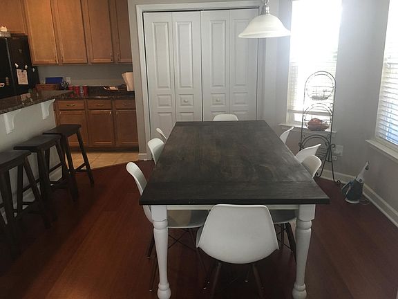 Open concept kitchen -- large eat in dining space.