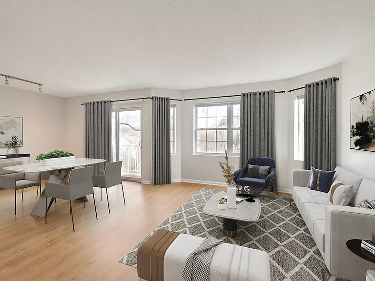 Renovated Package I living and dining room with hard surface flooring
