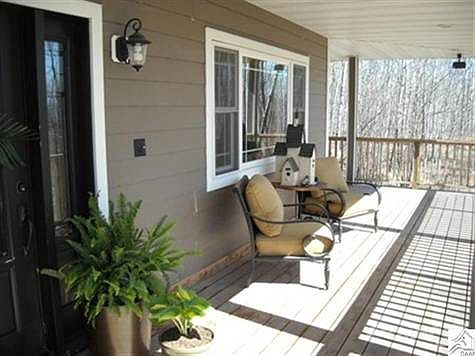 Entertain on the spacious wrap around porch.