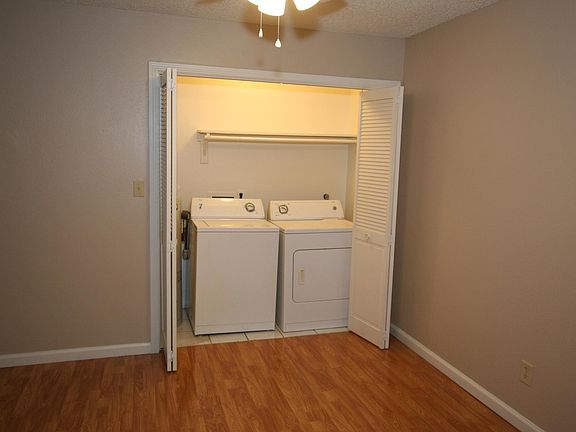 Washer and dryer in unit with shelf space