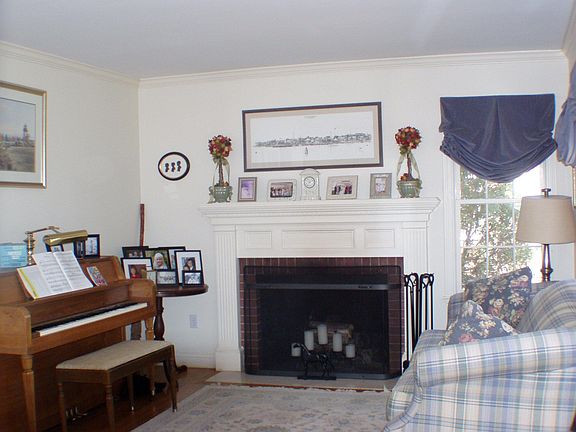 fireplaced living room, crown moldings