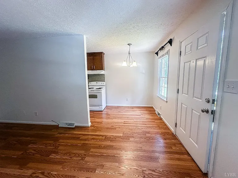 cozy dining area that comfortably accommodates a table for everyday meals or entertaining guests.