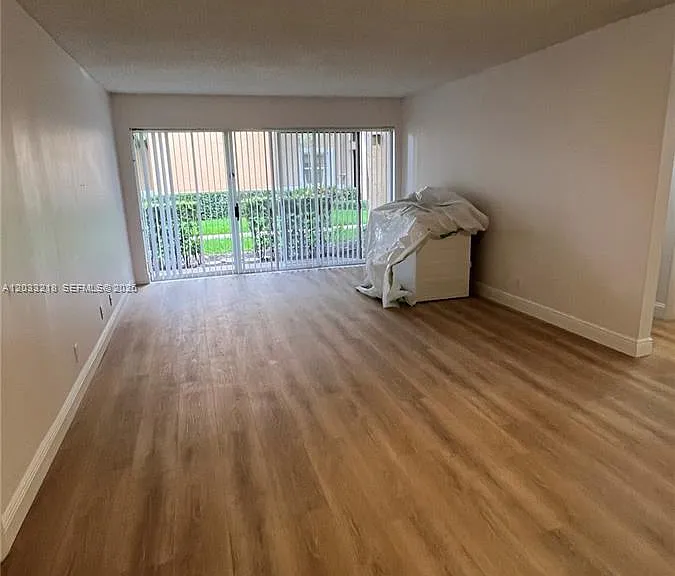 8851 Wiles Rd #108 — Photo 3