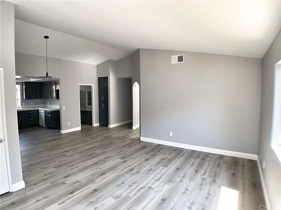 Spacious High Ceiling Living Room