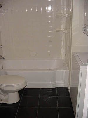 Updated bathroom tile floor,pedestal sink,stackable washer/dryer included