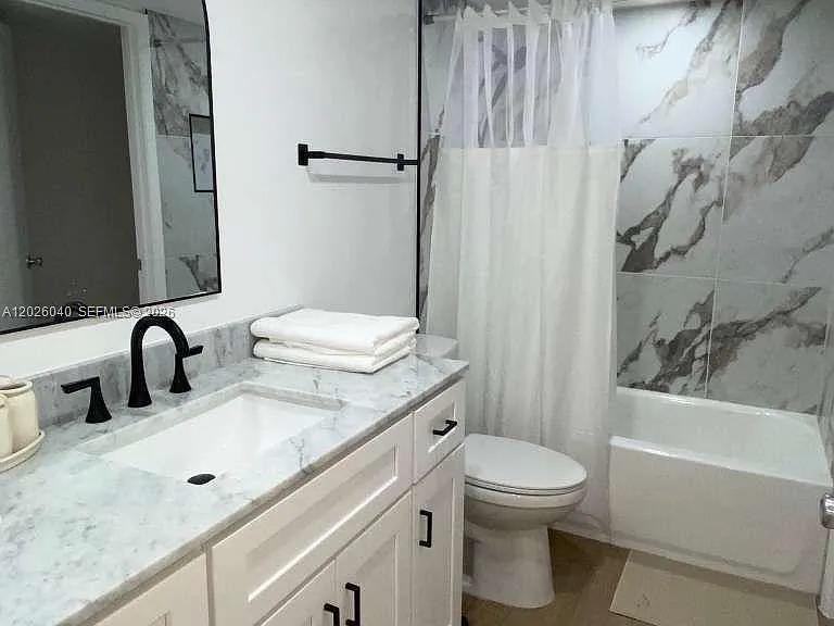 7350 Kinghurst Dr #305 — Photo 8