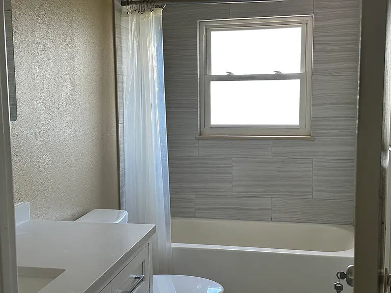 Upper shared remodeled bathroom