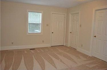 Master Bedroom Suite leads to full bath, walk in closet and balcony.