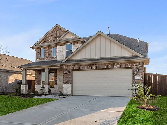 An additional view of your home featuring an inviting covered patio.