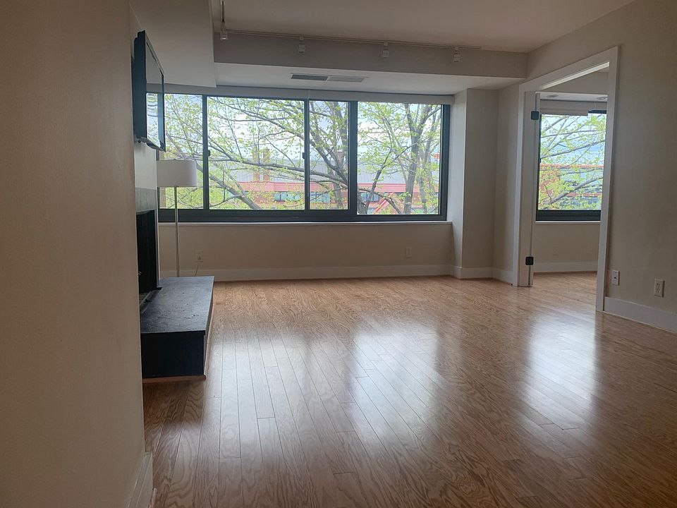 Living room and entry doors to Office / Guest bedroom