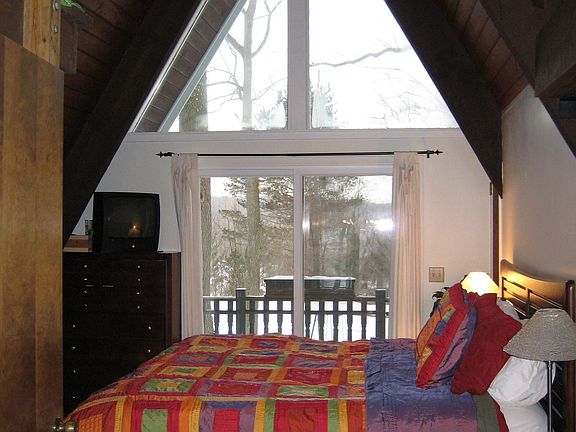 Master with vaulted ceiling and private balcony!