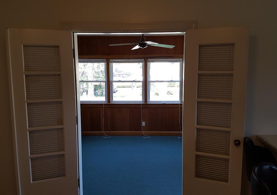 dining room opens to beautiful sun room