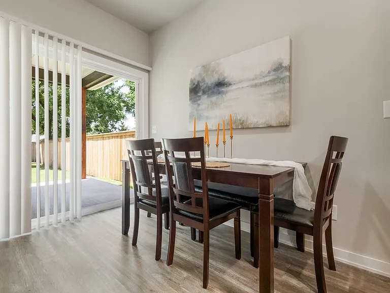 Dining room leads to backyard