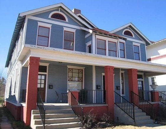Front view of building from sidewalk. 4 total units with private entrance to 2 upstairs units.