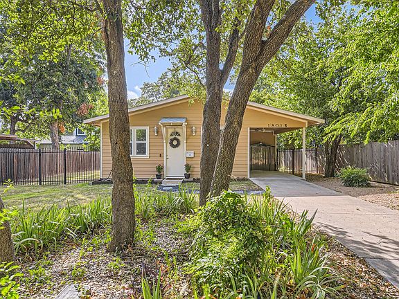 Covered carport for parking or storage. Driveway will fit 2 cars. Also Street parking available