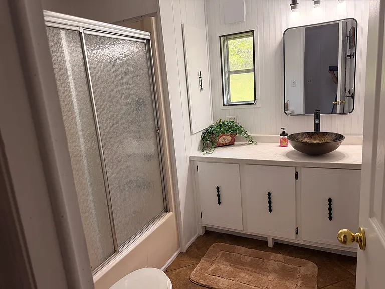 Main bathroom also has private access from Master bedroom